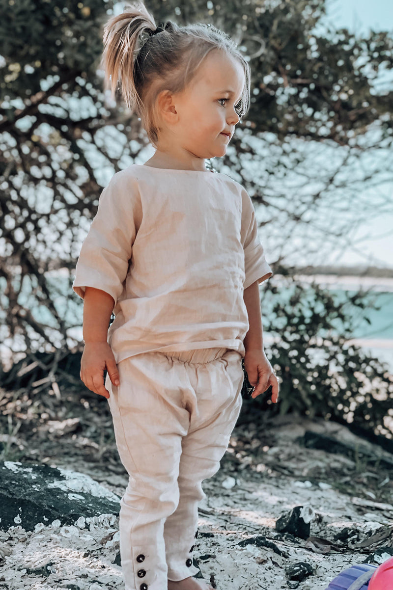 Kids, Bohemian style pant made from pink, 100% linen. Exclusive to We the Wild Collective